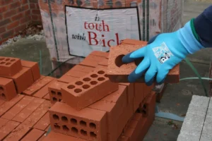 Pred Yukon holding Brick